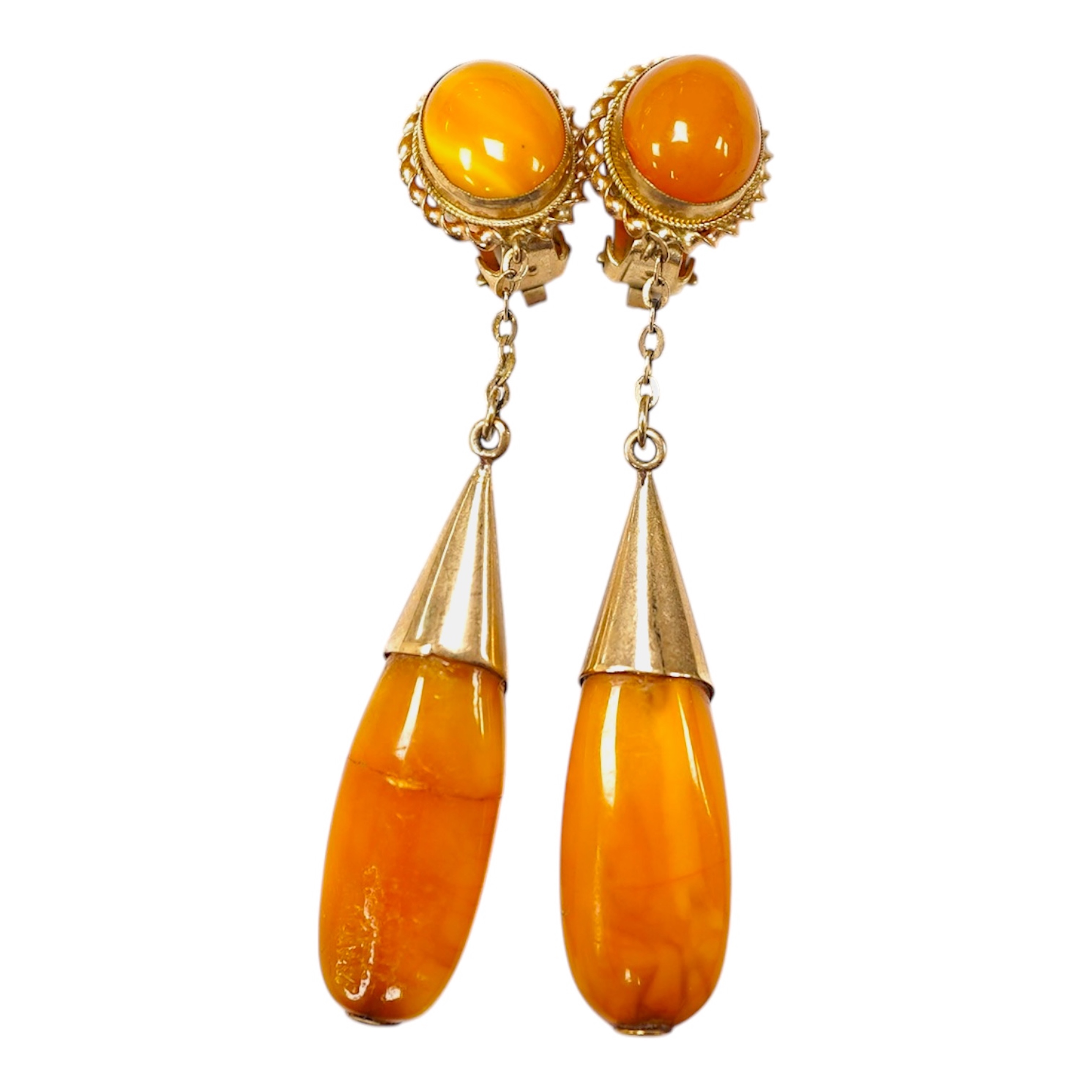 A pair of yellow metal and two stone amber set drop ear clips, 68mm, gross weight 8 grams. Condition - poor